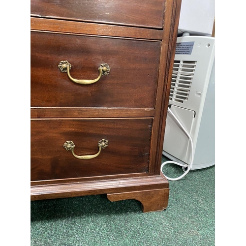 137 - AN ATTRACTIVE NEAT SIZED GEORGIAN MAHOGANY CHEST OF DRAWERS, with molded edge to rectangular top abo... 