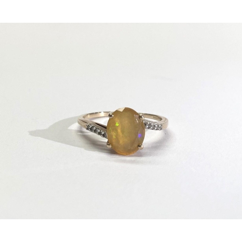 158 - A FANTASTIC OPAL AND DIAMOND 9CT GOLD SOLITAIRE RING, with beautiful vibrant oval cut opal to centre... 