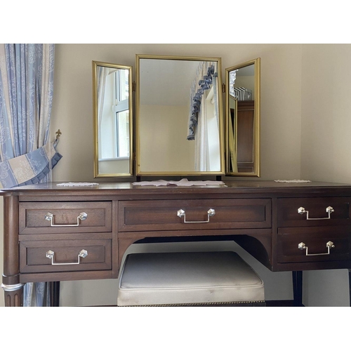 165 - A FINE MAHOGANY FIVE DRAWER VANITY/DRESSING TABLE, with fitted three panel mirror to top, five panel... 