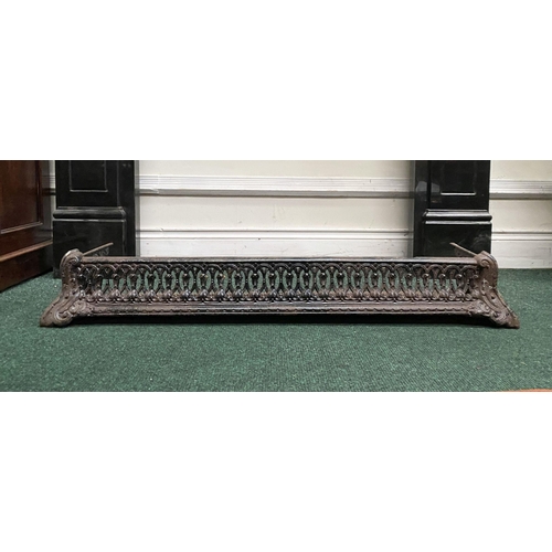 181 - A GOOD NEAT SIZED CAST FIRE FENDER, with scrolling openwork design, dimensions: 104cm wide x 17.5cm ... 