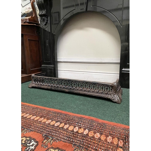 181 - A GOOD NEAT SIZED CAST FIRE FENDER, with scrolling openwork design, dimensions: 104cm wide x 17.5cm ... 