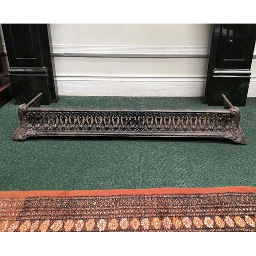 181 - A GOOD NEAT SIZED CAST FIRE FENDER, with scrolling openwork design, dimensions: 104cm wide x 17.5cm ... 