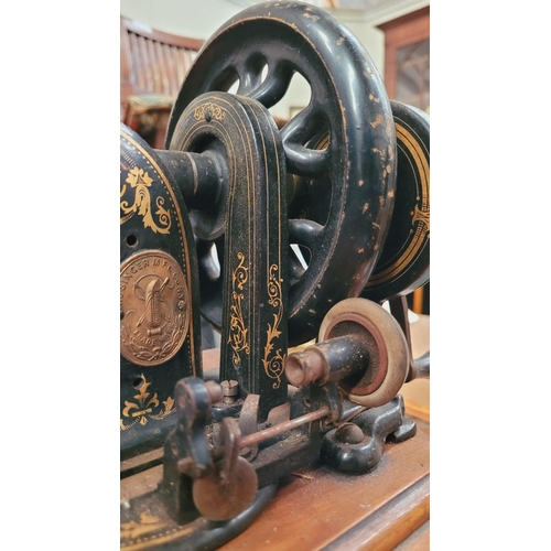 188 - A 19TH CENTURY HAND-CRANK FIDDLE-BASE SINGER SEWING MACHINE, a beautiful piece of antique machinery;... 