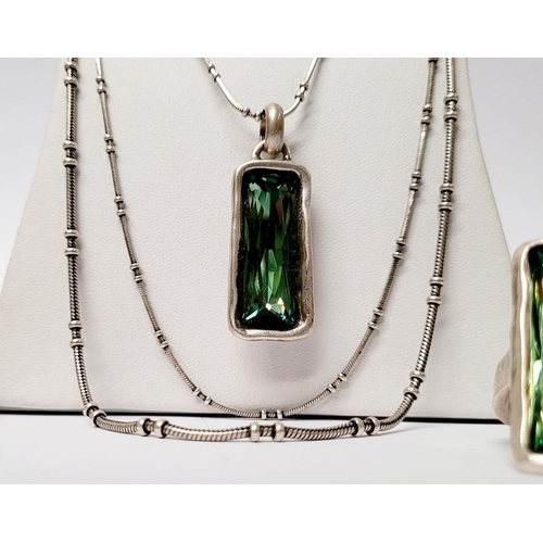 190 - A BEAUTIFUL UNO DE 50 AURORA BOREALIS SET; comprising of a pendant necklace, a pair of earrings & a ... 