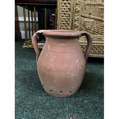 209 - A COLLECTION OF THREE TERRACOTTA PLANTERS, two of urn form with double handles, the larger of urn fo... 