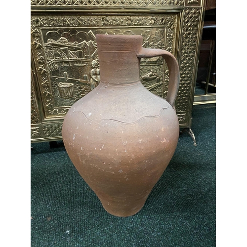 209 - A COLLECTION OF THREE TERRACOTTA PLANTERS, two of urn form with double handles, the larger of urn fo... 