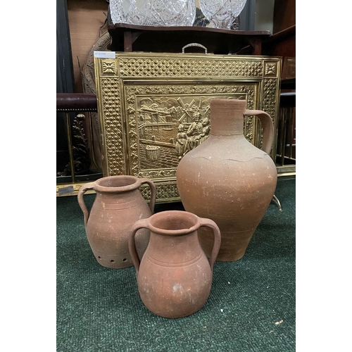 209 - A COLLECTION OF THREE TERRACOTTA PLANTERS, two of urn form with double handles, the larger of urn fo... 