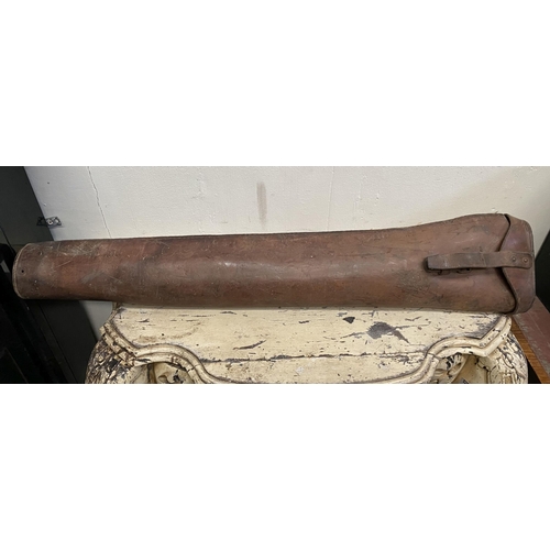 211 - AN ANTIQUE LEATHER GUNCASE, with carrying strap. Dimensions: 78cm long approx.