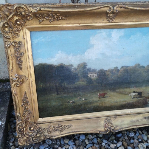 228 - A FINE GILT-FRAMED 19TH CENTURY PASTORAL SCENE, with a house to the background and farm animals to t... 