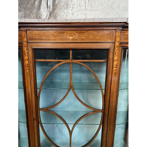 24 - AN EDWARDIAN GLAZED DISPLAY CABINET, with stepped pediment top over an inlaid frieze; depicting ribb... 