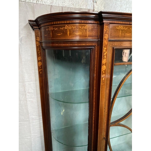 24 - AN EDWARDIAN GLAZED DISPLAY CABINET, with stepped pediment top over an inlaid frieze; depicting ribb... 