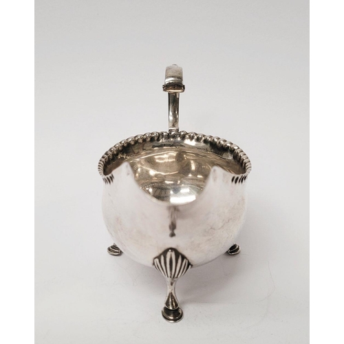 4 - A VERY FINELY CRAFTED GEORGIAN LATE 18TH CENTURY SOLID SILVER SAUCE BOAT BY JOHN LANGLANDS I, with a... 