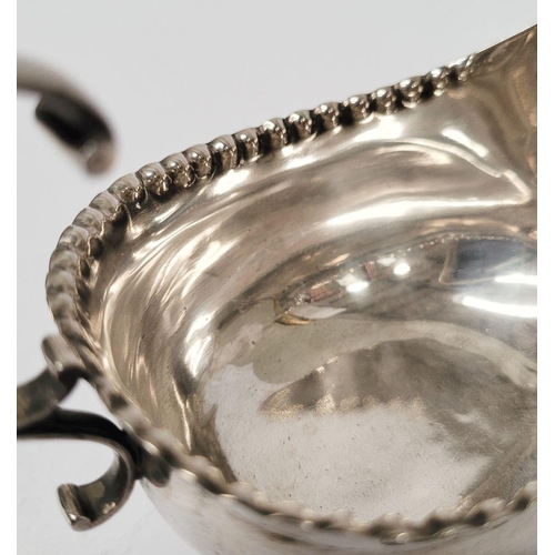 4 - A VERY FINELY CRAFTED GEORGIAN LATE 18TH CENTURY SOLID SILVER SAUCE BOAT BY JOHN LANGLANDS I, with a... 