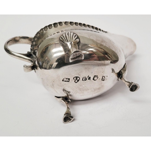 4 - A VERY FINELY CRAFTED GEORGIAN LATE 18TH CENTURY SOLID SILVER SAUCE BOAT BY JOHN LANGLANDS I, with a... 