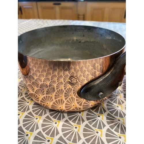 45 - A VERY GOOD SET OF FIVE POLISHED FRENCH COPPER & CAST IRON HANDLED GRADUATED SAUCEPANS, impressed to... 