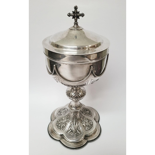 47 - A VERY DECORATIVE IRISH SILVER & GILT CIBORIUM, the lid with a cross finial, the bowl decorated with... 