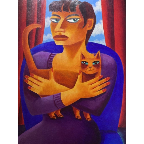 5 - GRAHAM KNUTTEL (Irish, 1954-2023), ‘RUTH WITH CAT’, oil on canvas, signed lower left. Depicting port... 