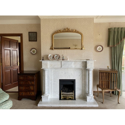 52 - A GOOD ARCHED GILT OVERMANTLE MIRROR, the fluted border with scroll crest to top and scrolls to base... 