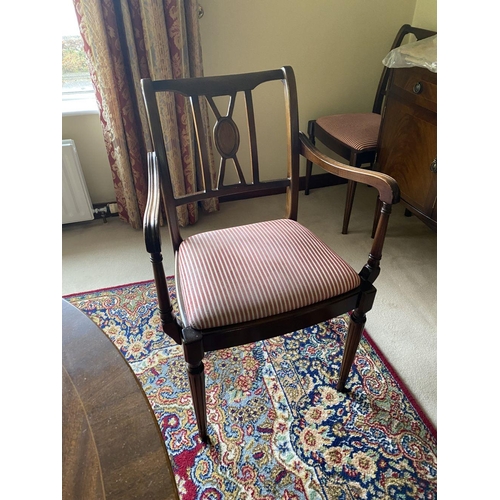 55 - A SET OF FOUR MAHOGANY EDWARDIAN DINING CHAIRS AND TWO CARVERS, with pierced back splat, fluted armr... 