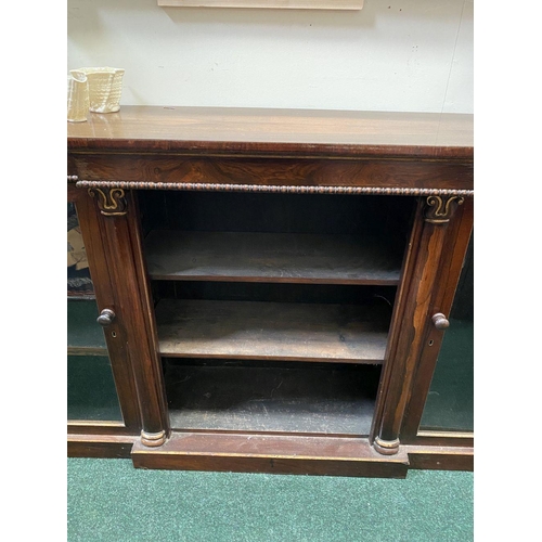 56 - A 19TH CENTURY IRISH ROSEWOOD BREAKFRONT FLOOR BOOKCASE, the top having square edge with molding abo... 