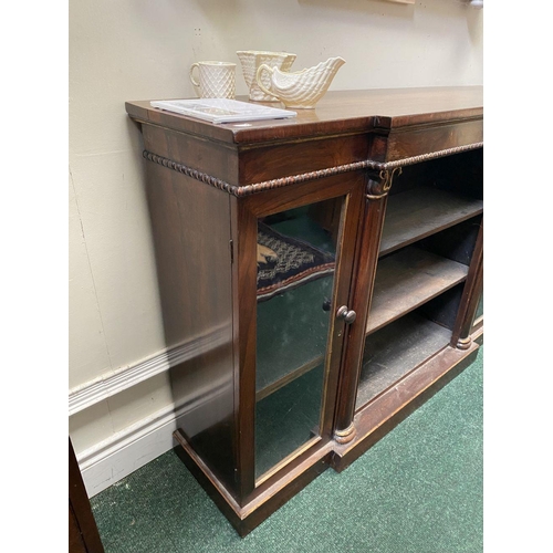 56 - A 19TH CENTURY IRISH ROSEWOOD BREAKFRONT FLOOR BOOKCASE, the top having square edge with molding abo... 