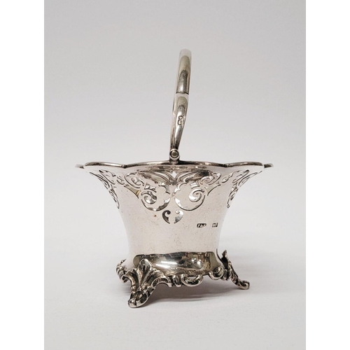 6 - A BEAUTIFUL EARLY 19TH CENTURY SOLID SILVER SCALLOP EDGED BASKET WITH SWING HANDLE, decorated with a... 