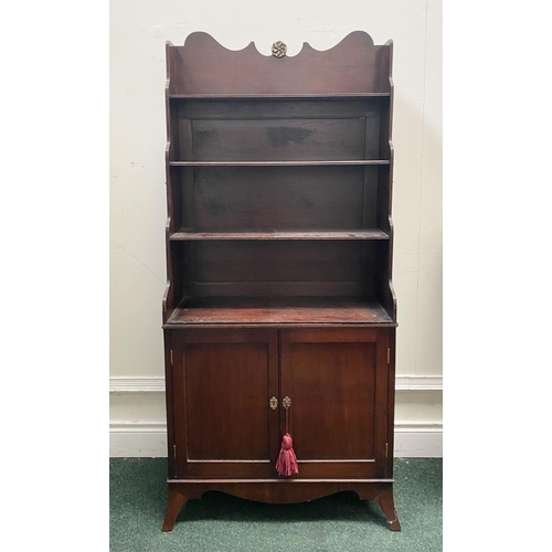 66 - A FINE GEORGE III MAHOGANY WATERFALL BOOKCASE CABINET, with three cascading open shelves, enclosed b... 