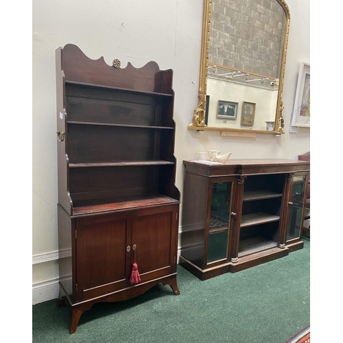 66 - A FINE GEORGE III MAHOGANY WATERFALL BOOKCASE CABINET, with three cascading open shelves, enclosed b... 