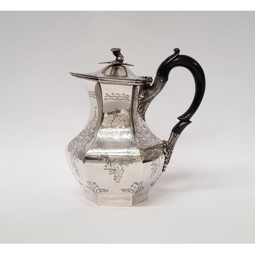 7 - A VERY FINE IRISH 19TH CENTURY SILVER HOT WATER/MILK POT / TEA POT, decorated all over with scrollin... 