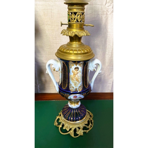 78 - A FANTASTIC PAIR OF VICTORIAN PORCELAIN & BRASS OIL LAMPS, complete with frosted globe shaped lamp s... 