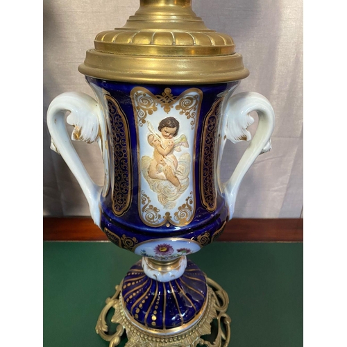 78 - A FANTASTIC PAIR OF VICTORIAN PORCELAIN & BRASS OIL LAMPS, complete with frosted globe shaped lamp s... 