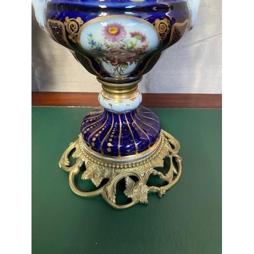 78 - A FANTASTIC PAIR OF VICTORIAN PORCELAIN & BRASS OIL LAMPS, complete with frosted globe shaped lamp s... 