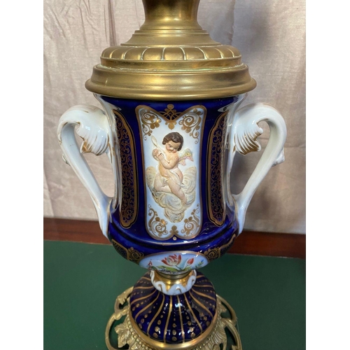 78 - A FANTASTIC PAIR OF VICTORIAN PORCELAIN & BRASS OIL LAMPS, complete with frosted globe shaped lamp s... 