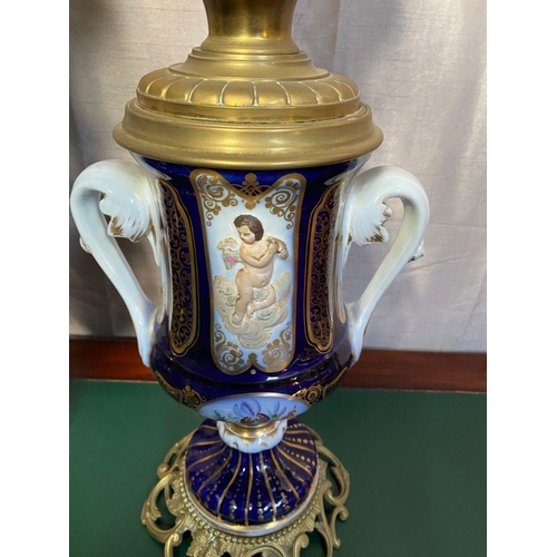 78 - A FANTASTIC PAIR OF VICTORIAN PORCELAIN & BRASS OIL LAMPS, complete with frosted globe shaped lamp s... 