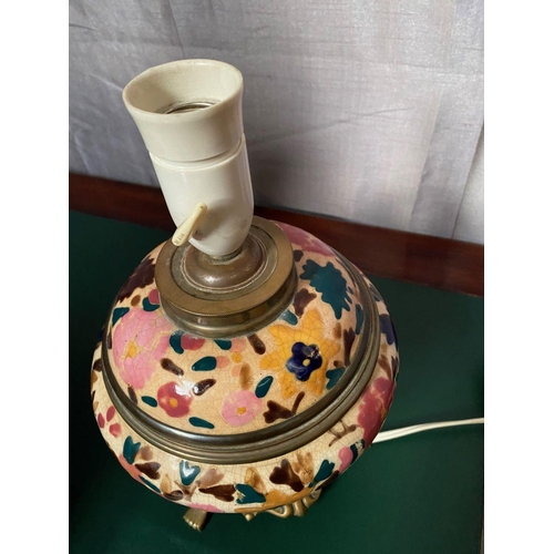 84 - A VINTAGE CRACKLE GLAZE BRASS MOUNTED TABLE LAMP, decorated with floral design. 30cm tall.