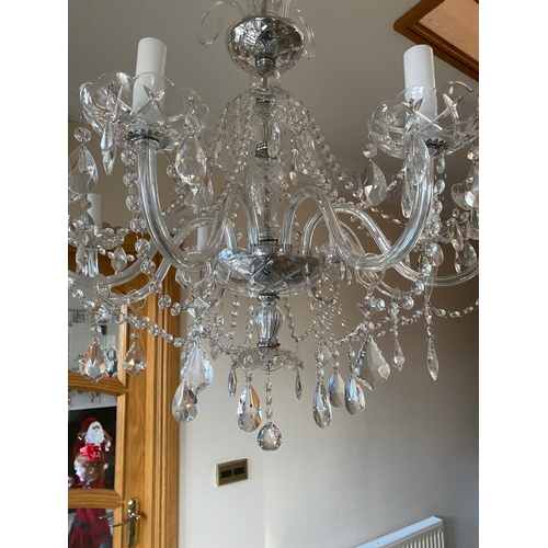 88 - A GOOD EIGHT BRANCH CUT GLASS CHANDELIER, with cut glass bowl above four scrolls with leaves to top,... 