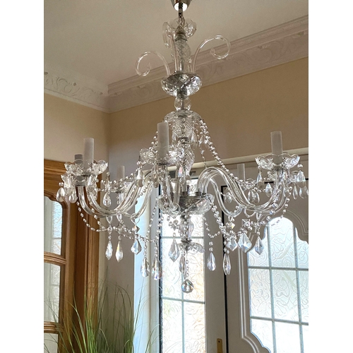 88 - A GOOD EIGHT BRANCH CUT GLASS CHANDELIER, with cut glass bowl above four scrolls with leaves to top,... 