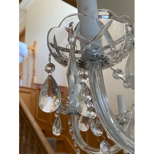 88 - A GOOD EIGHT BRANCH CUT GLASS CHANDELIER, with cut glass bowl above four scrolls with leaves to top,... 