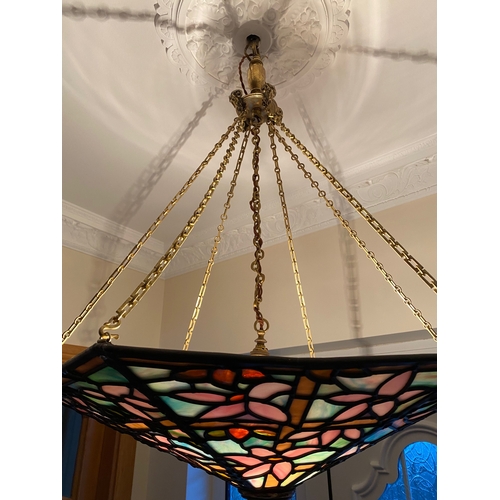 123 - A BEAUTIFUL ART DECO COLOURED GLASS LEADED LAMPSHADE, with six panels of multi-coloured glass in flo... 