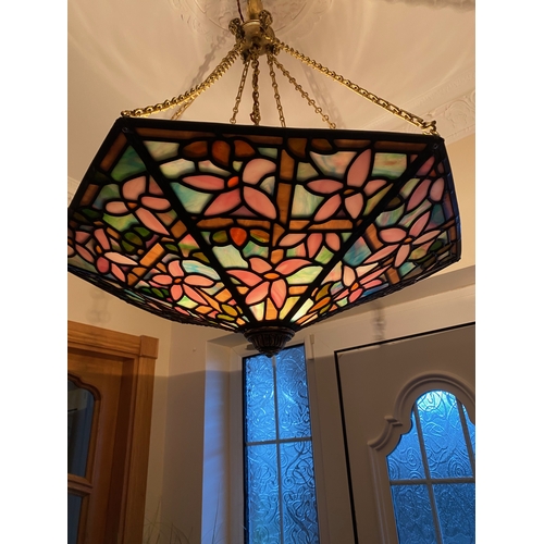 123 - A BEAUTIFUL ART DECO COLOURED GLASS LEADED LAMPSHADE, with six panels of multi-coloured glass in flo... 