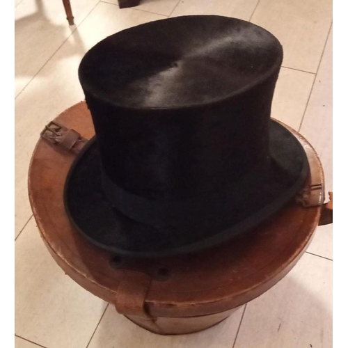 104 - A VINTAGE TOP HAT & ORIGINAL LEATHER CARRY CASE.