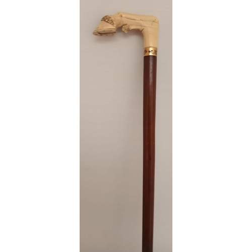 105 - A SUPERB ANTIQUE KNOPPED WALKING STICK, the handle in the form of a carved hairy shoed hoof, fantast... 