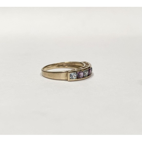 109 - A PRETTY 9CT GOLD BLUE AND PINK STONE HALF ETERNITY RING, with seven round cut pink and pale blue ge... 