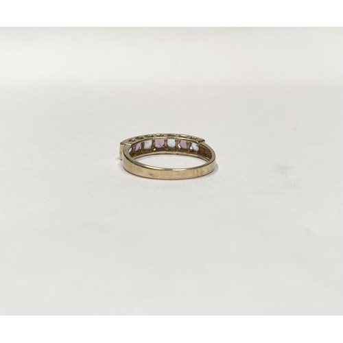 109 - A PRETTY 9CT GOLD BLUE AND PINK STONE HALF ETERNITY RING, with seven round cut pink and pale blue ge... 