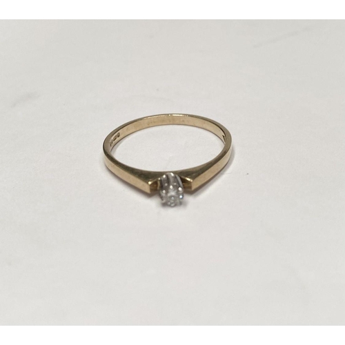 111 - A BEAUTIFUL 9CT YELLOW GOLD DIAMOND SOLITAIRE RING, with beautiful round cut diamond in raised prong... 