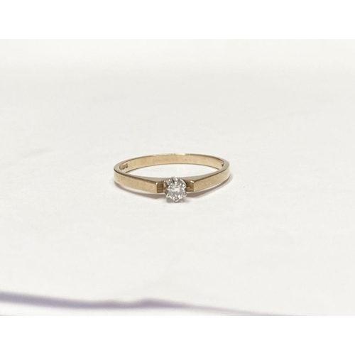 111 - A BEAUTIFUL 9CT YELLOW GOLD DIAMOND SOLITAIRE RING, with beautiful round cut diamond in raised prong... 