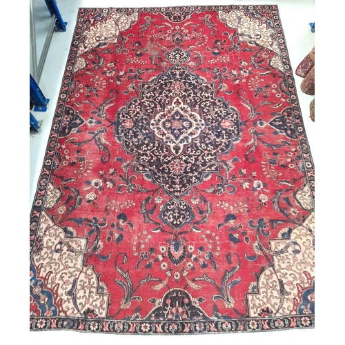 12 - AN EXCELLENT PERSIAN TABRIZ RUG, hand-knotted, featuring traditional Tabriz design with central meda... 