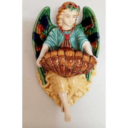 130 - AN ANTIQUE HAND GLAZED MAJOLICA ANGEL FONT, circa 1900, nice brightly coloured decorative piece in e... 