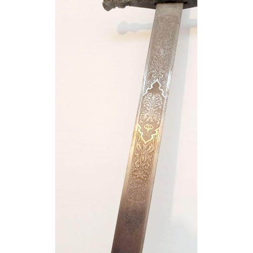 132 - A SPANISH CARLOS V COMMEMORATIVE TOLEDO MADE SWORD, with engraved blade. Dimensions: 107cm long over... 