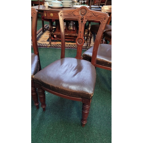 138 - A LOVELY SET OF FOUR VICTORIAN DINING CHAIRS, each with carved back rests with a central back splat ... 